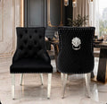Black velvet Majestic lion knocker dining chairs with buttoned back and chrome legs