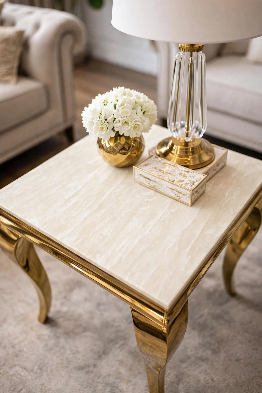 Cream and gold Louis lamp table with marble top beside sofa – luxury UK side table