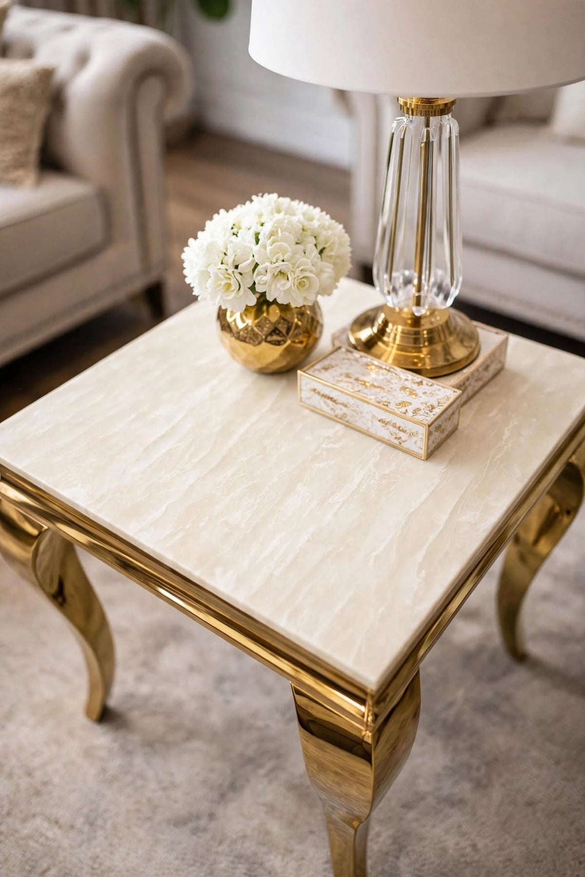 Cream and gold Louis lamp table with marble top beside sofa – luxury UK side table