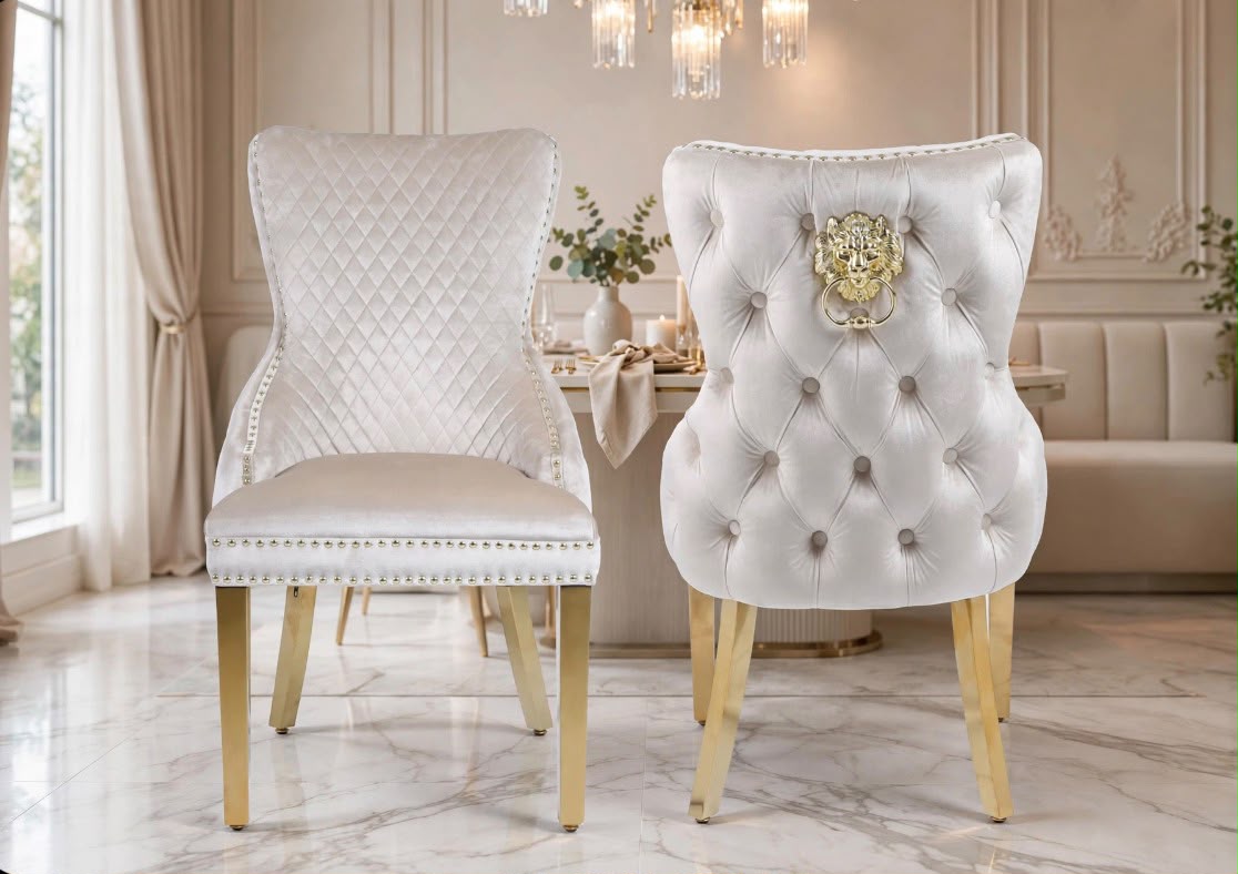 Cream velvet Victoria lion knocker dining chairs with button-tufted back, gold lion ring and gold legs
