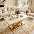 Elina cream marble and gold coffee table with sculptural interlaced gold base in luxury living room