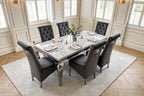 Light grey marble Louis dining table with six dark grey velvet Sofia lion knocker chairs and chrome legs – luxury dining set UK