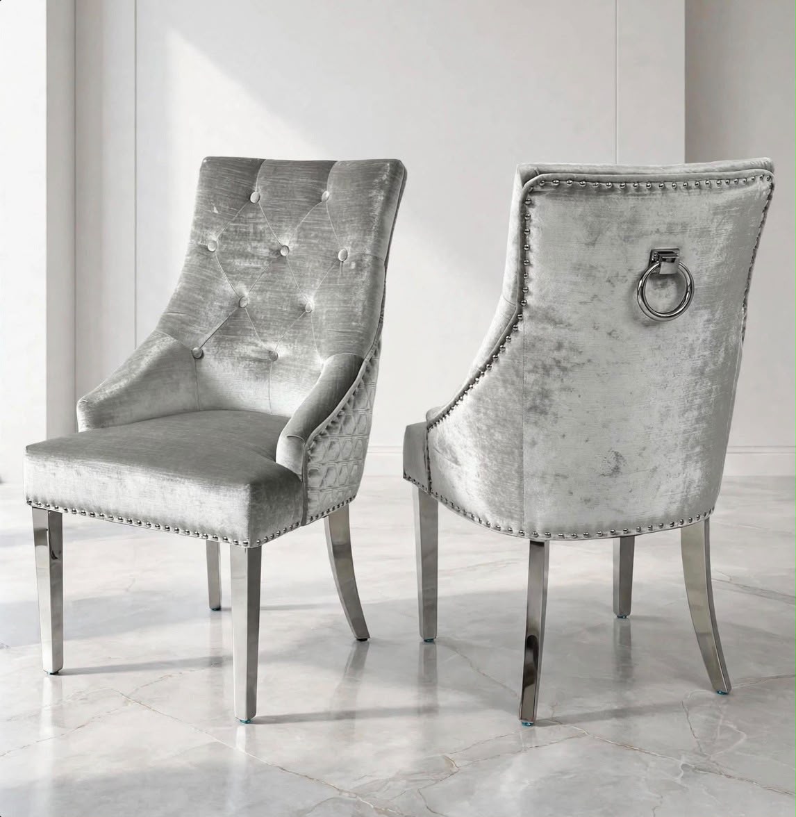 Light grey silver velvet Valencia ring knocker dining chairs with buttoned back and chrome legs