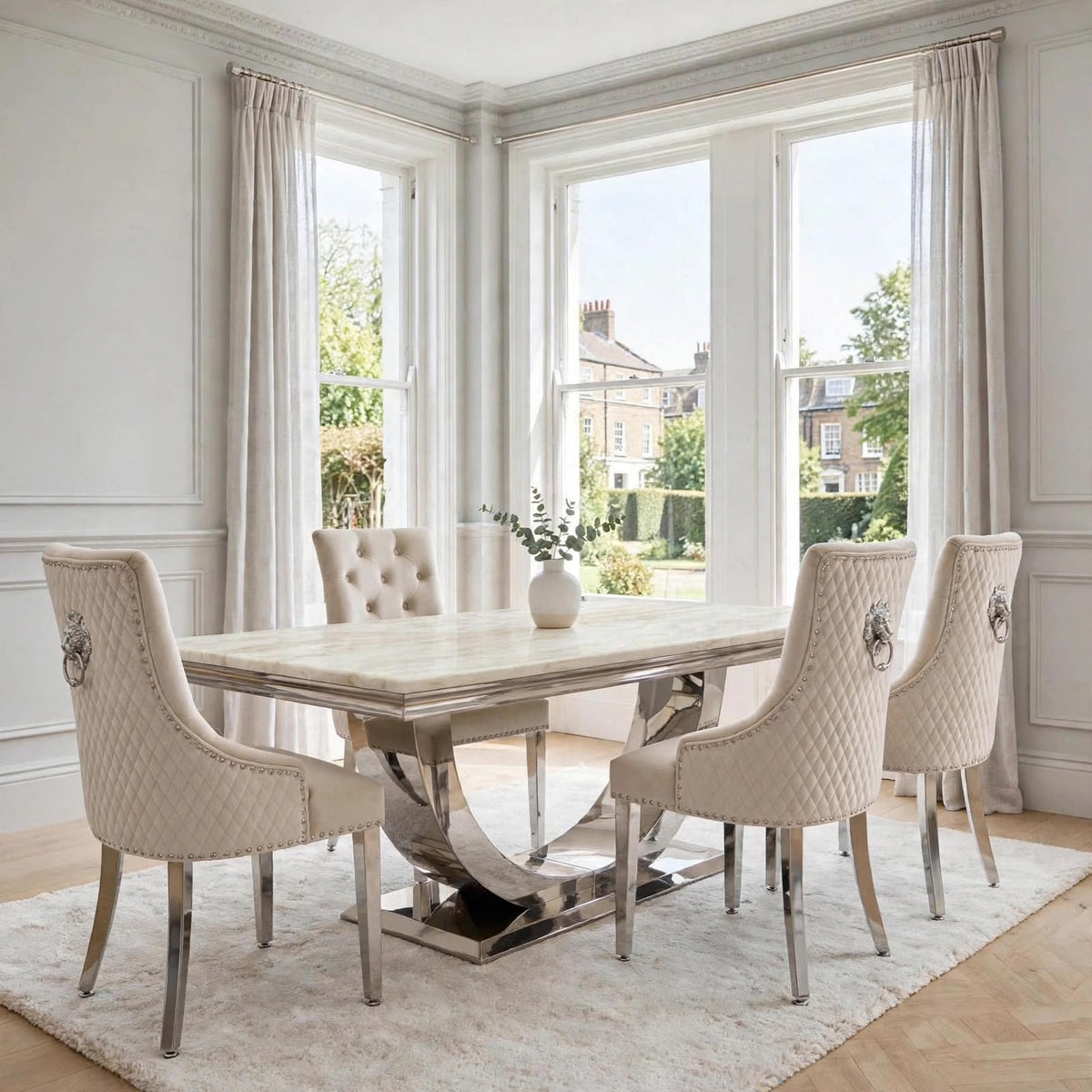 Cream marble dining table with polished chrome London base and four mink velvet Majestic chairs