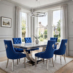London light grey marble dining set with six navy blue velvet Majestic chairs with tufted backs in a modern dining room