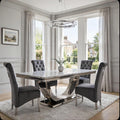 Light grey marble dining table with polished chrome London base and four dark grey velvet Sofia chairs