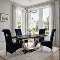 Black marble dining table with polished chrome London base and four black velvet Sofia chairs