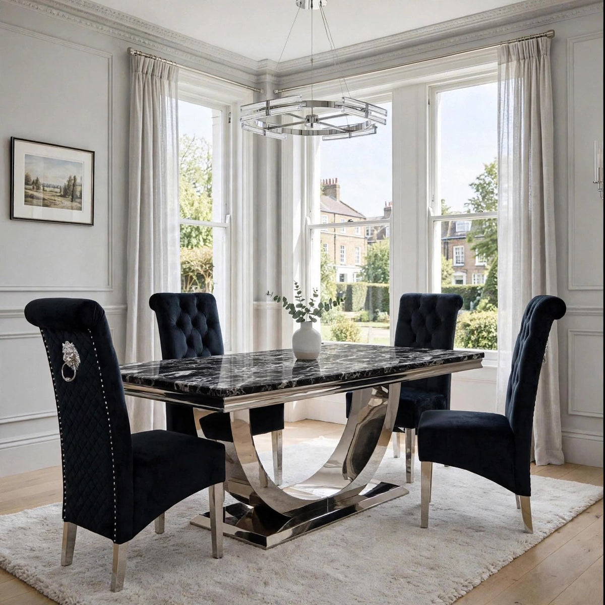 Black marble dining table with polished chrome London base and four black velvet Sofia chairs