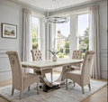 Cream marble dining table with polished chrome London base and four mink velvet Sofia chairs