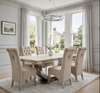 London cream marble dining set with six mink velvet Sofia chairs in a bright dining room