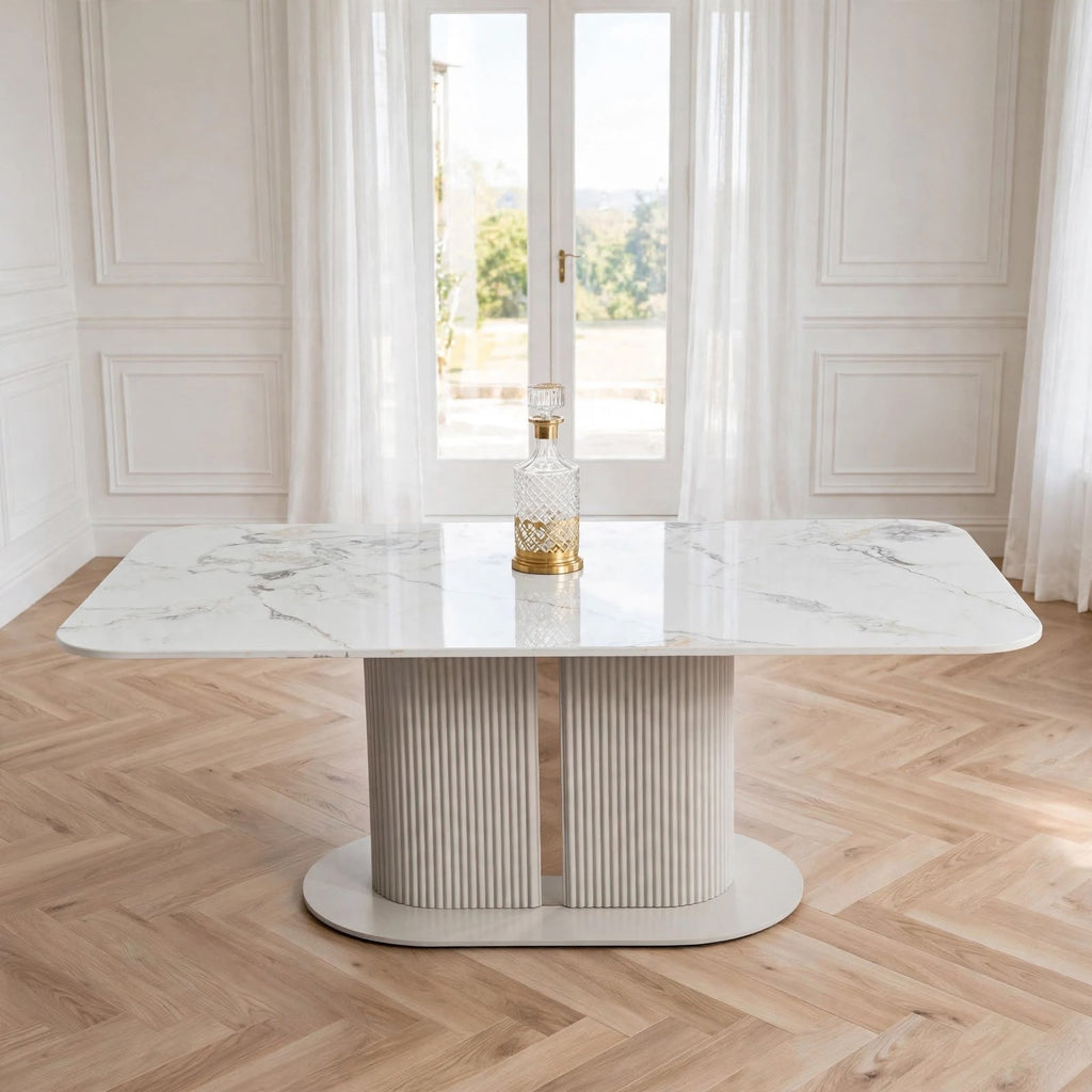 Sydney cream marble dining table with white Calacatta top and fluted cream pedestal base – luxury dining table