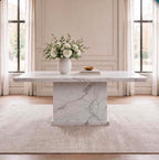 White marble dining table 1.5m with rectangular top and solid marble pedestal base in a luxury dining room
