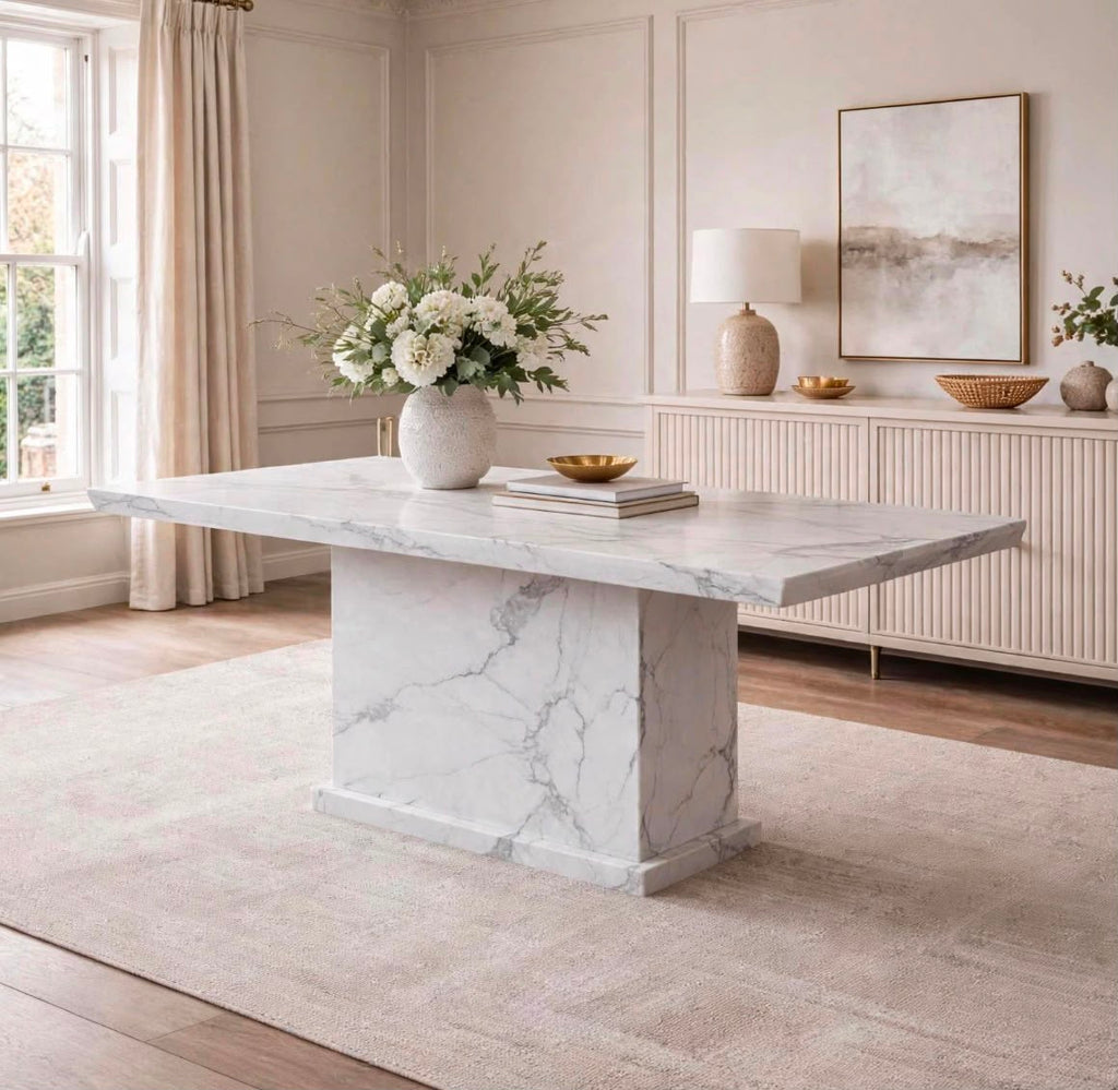 Side view of a 1.5m rectangular white marble dining table with a solid marble pedestal base