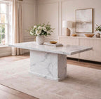 Side view of a 1.5m rectangular white marble dining table with a solid marble pedestal base